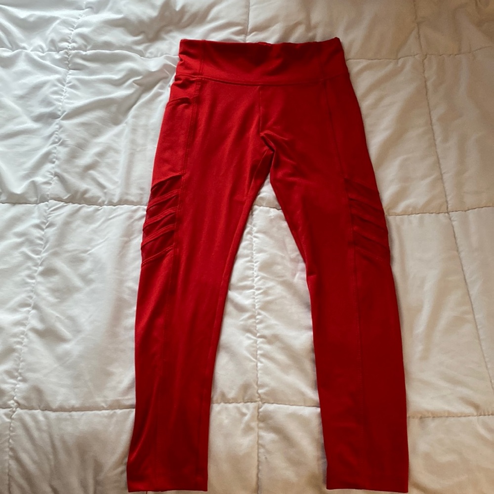 Red leggings with side pockets